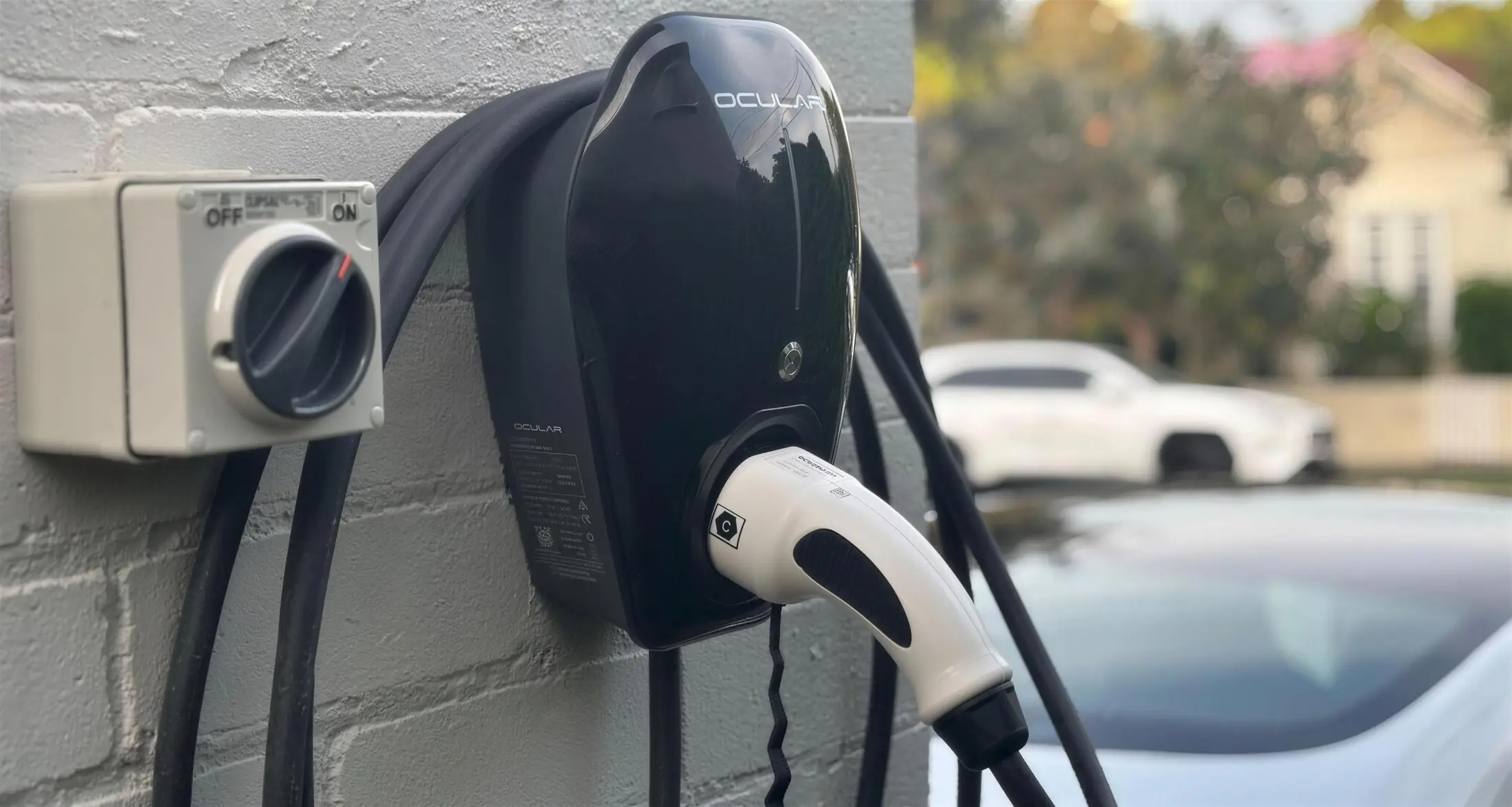 EV charger installed on a garage wall